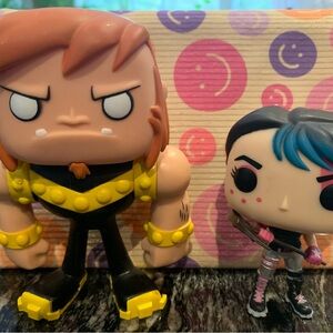 Funko Action Figures with Black, Yellow, and Blue Accents
